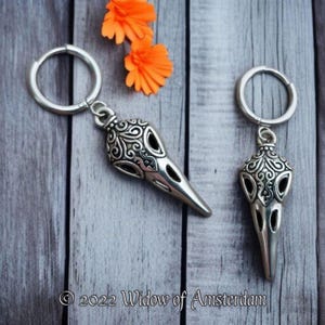 Crow Skull Hoop Earrings: Ornately Crafted Bird Skulls on Silver Stainless Steel Huggie Hoops