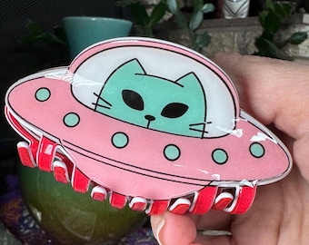 Alien cat in UFO hair clip.