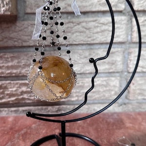 Moon crystal ball sphere stand.