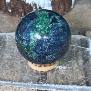 Blue kyanite, ruby and fuchsite sphere