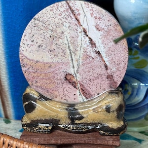 Pink picture Jasper slab on picture Jasper slab stand