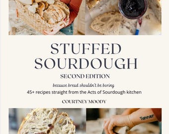 May include: A cookbook titled "Stuffed Sourdough: Second Edition" with the subtitle "because bread shouldn't be boring" and the author's name "Courtney Moody". The cover features photos of sourdough bread, including a close-up of a loaf sliced open to reveal a berry filling.