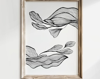 May include: A framed black and white line art print of stylized leaves and branches. The print is in a light wood frame.