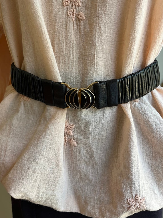 Vintage stretch black leather belt.
