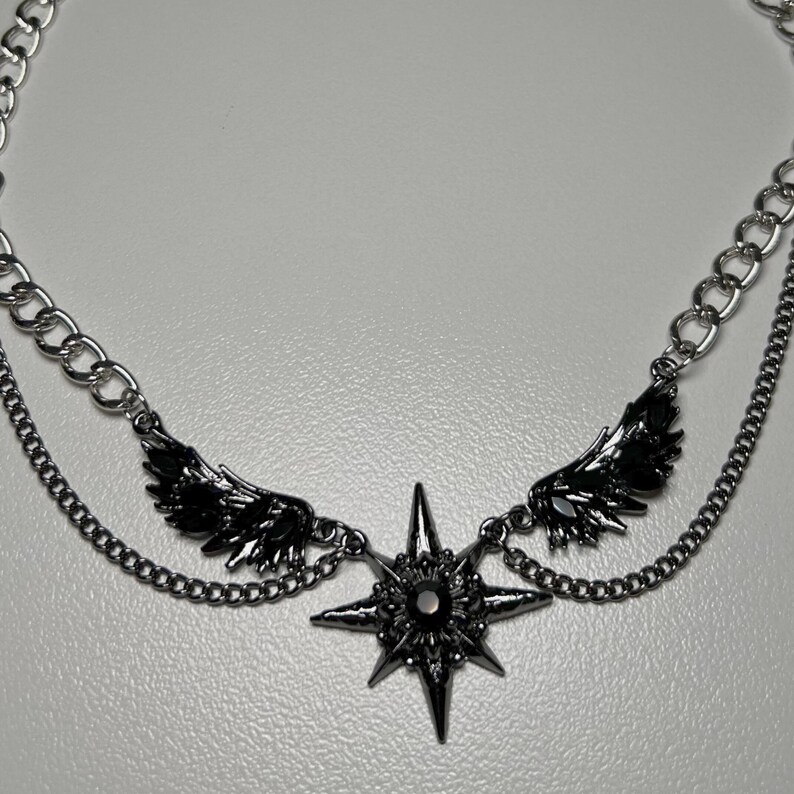gothic necklace, black necklace, star necklace, winged angel pendant, gothic jewelry, dark angel wing, vampire aesthetic, grunge jewelry, chain necklace, dark aesthetic, statement necklace, edgy necklace, y2k jewelry