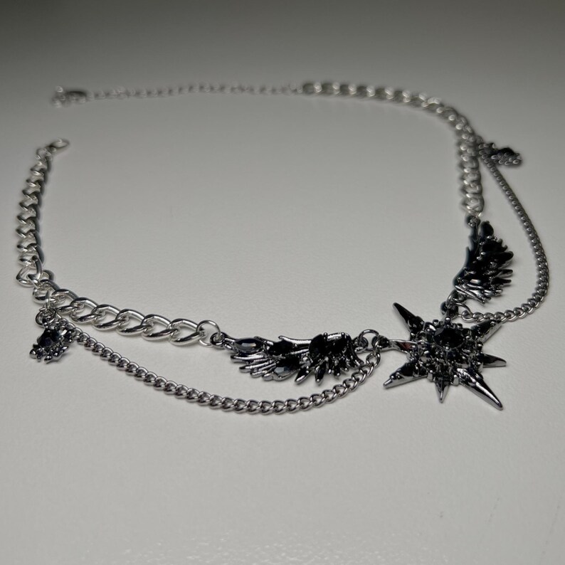 gothic necklace, black necklace, star necklace, winged angel pendant, gothic jewelry, dark angel wing, vampire aesthetic, grunge jewelry, chain necklace, dark aesthetic, statement necklace, edgy necklace, y2k jewelry