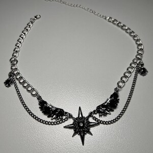 gothic necklace, black necklace, star necklace, winged angel pendant, gothic jewelry, dark angel wing, vampire aesthetic, grunge jewelry, chain necklace, dark aesthetic, statement necklace, edgy necklace, y2k jewelry