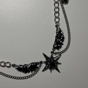 gothic necklace, black necklace, star necklace, winged angel pendant, gothic jewelry, dark angel wing, vampire aesthetic, grunge jewelry, chain necklace, dark aesthetic, statement necklace, edgy necklace, y2k jewelry