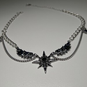 gothic necklace, black necklace, star necklace, winged angel pendant, gothic jewelry, dark angel wing, vampire aesthetic, grunge jewelry, chain necklace, dark aesthetic, statement necklace, edgy necklace, y2k jewelry