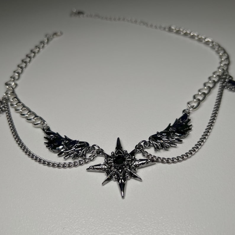 gothic necklace, black necklace, star necklace, winged angel pendant, gothic jewelry, dark angel wing, vampire aesthetic, grunge jewelry, chain necklace, dark aesthetic, statement necklace, edgy necklace, y2k jewelry