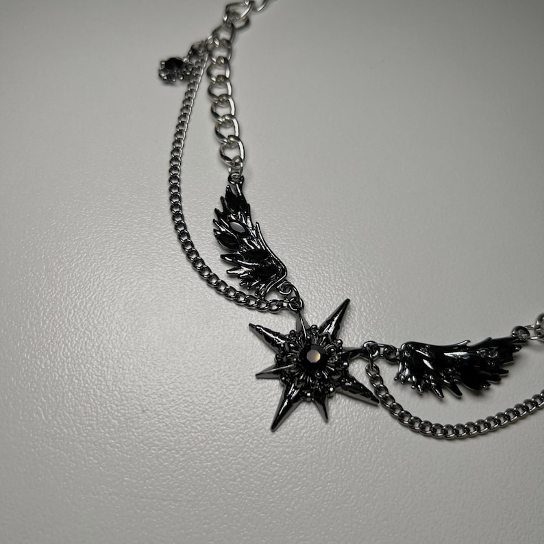 gothic necklace, black necklace, star necklace, winged angel pendant, gothic jewelry, dark angel wing, vampire aesthetic, grunge jewelry, chain necklace, dark aesthetic, statement necklace, edgy necklace, y2k jewelry