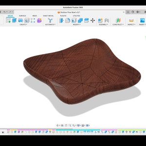 May include: A 3D model of a wooden bowl with a brown wood grain finish. The bowl has a slightly irregular shape and is designed with a series of lines that create a web-like pattern.