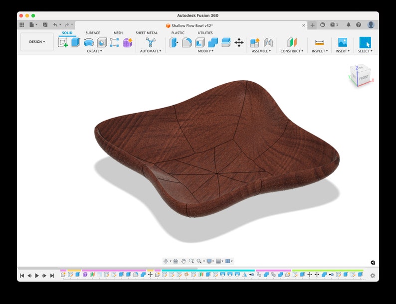 May include: A 3D model of a wooden bowl with a brown wood grain finish. The bowl has a slightly irregular shape and is designed with a series of lines that create a web-like pattern.