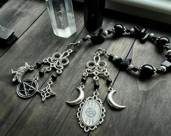 Hekate prayer beads with Obsidian, Witch's ladder with Raven, Pentacle, Witch knot, Crescent moons and Triple Moon Goddess charm, Pagan