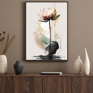 May include: A watercolor painting of a pink lotus flower with green leaves and black accents. The painting is set against a white background with splashes of brown and yellow paint.