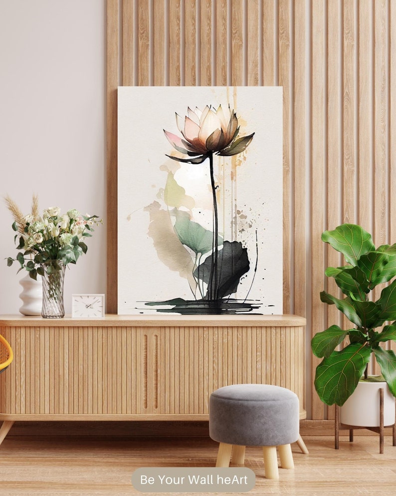 May include: A watercolor painting of a pink and brown lotus flower with green leaves and water droplets. The background is a light beige color with splashes of green, brown, and black paint.
