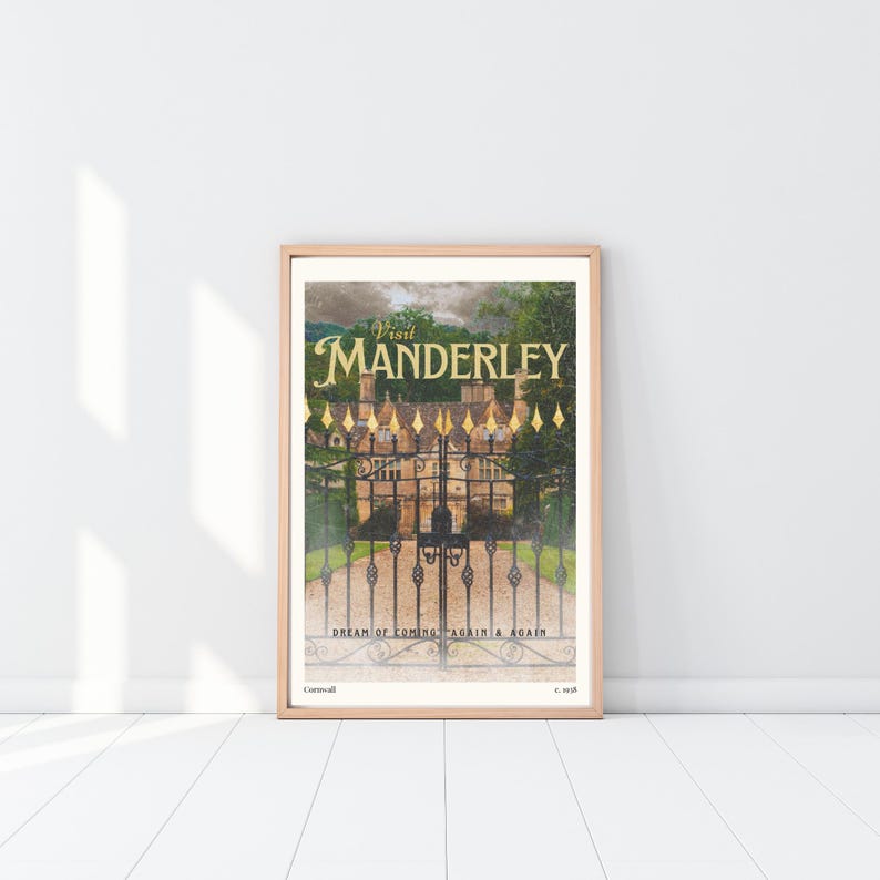 May include: A vintage-style poster featuring a photograph of a large, stone house with a black iron gate in front. The text on the poster reads "Visit Manderley" in gold lettering. The poster also includes the text "Dream of coming again & again" and "Cornwall" in smaller lettering.