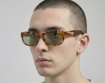 Vintage-Sonnenbrille aus den 90ern – STING – Rechteckige, umlaufende Sonnenbrille im urbanen Stil