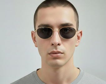 Vintage Sting Sonnenbrille aus den 90er Jahren – Gold, oval, hergestellt in Italien