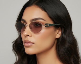 Vintage-Sonnenbrille aus den 90ern – Nina Ricci – Glamouröses ovales Türkis