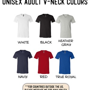 May include: A chart showing the different colour options for a unisex adult v-neck t-shirt. The colours shown are white, black, heather grey, navy, red, and true royal. The text "...FOR COUNTRIES OUTSIDE THE US. PLEASE MESSAGE ME FOR AVAILABILITY OF AVAILABLE COLOURS." is at the bottom of the chart.