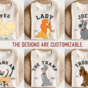 May include: Six different t-shirt designs featuring characters from the Disney movie Lady and the Tramp. Each shirt has a different character and the text "EST. 1955". The characters include Lady, Tramp, Jock, Trusty, Peg, and Si and Am.