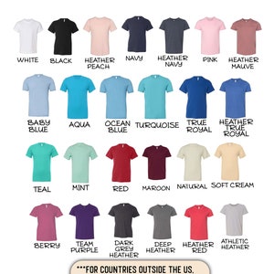 May include: A chart displaying 18 different colours of crew neck t-shirts. The colours include white, black, heather peach, navy, heather navy, pink, heather mauve, baby blue, aqua, ocean blue, turquoise, true royal, heather true royal, teal, mint, red, maroon, natural, soft cream, berry, team purple, dark grey heather, deep heather, heather red, and athletic heather. The text "FOR COUNTRIES OUTSIDE THE US, PLEASE MESSAGE ME FOR AVAILABILITY OF AVAILABLE COLORS." is at the bottom of the chart.