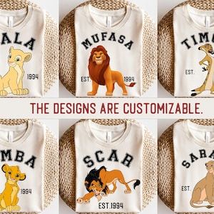 May include: Six different t-shirt designs featuring characters from the Lion King movie. Each shirt has a different character, including Simba, Nala, Mufasa, Scar, Timon, and Sarabi. The shirts are all white with black text and a graphic of the character. The text on each shirt says "EST. 1994".