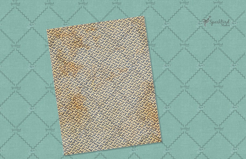 May include: A vintage-style patterned paper with a yellow background and a blue floral design. The paper has a distressed look with faded areas and a textured surface.