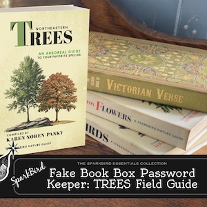 May include: A book titled "Northeastern Trees: An Arboreal Guide to Your Favorite Species" by Karen Noren-Panky. The book cover features illustrations of trees and is stacked on top of other books, including "Victorian Verse" and "Flowers: A Sparkbird Nature Guide".