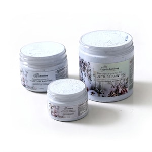 May include: Three white plastic jars of decorative plaster for sculpture painting. The jars are labelled with the text "Eugenia Ermilova Decorative plaster for SCULPTURE PAINTING". The plaster is a light blue colour and the jars have floral designs.