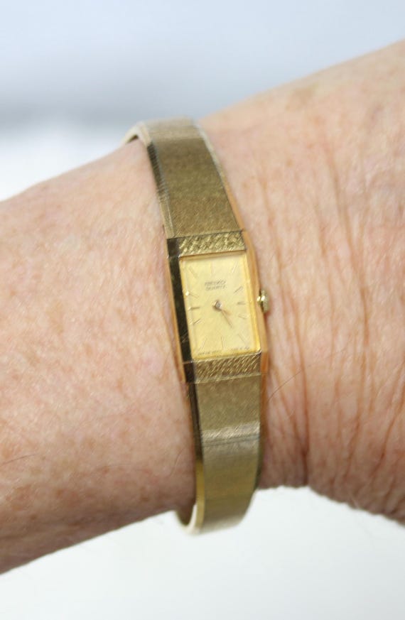 Seiko 14k gold ladies watch hotsell