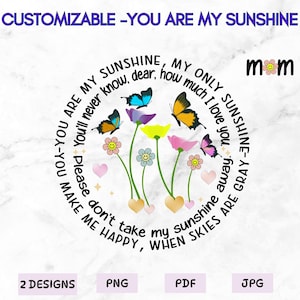 Può includere: Un design circolare con una citazione che recita: "Tu sei il mio sole, il mio unico sole. Non saprai mai, tesoro, quanto ti amo. Per favore, non portarmi via il mio sole. Quando il cielo è grigio, mi rendi felice." La citazione è circondata da fiori e farfalle colorati. La parola "mamma" si trova nell'angolo in alto a destra del design.