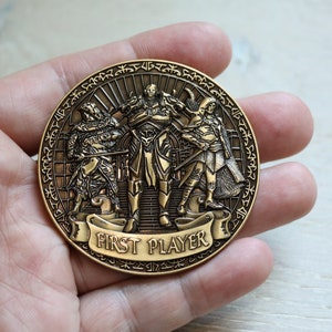First Player Metal Coin