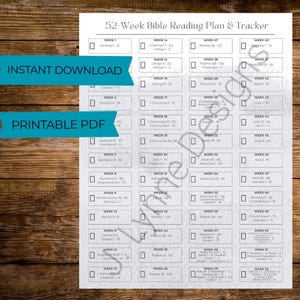 May include: A 52-Week Bible Reading Plan & Tracker printable PDF. The white paper has a grid layout with checkboxes and text. The words "Instant Download" and "Printable PDF" are on blue banners. The background is a wooden surface.