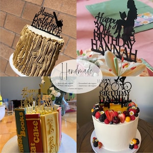 May include: Four different cakes decorated with personalized cake toppers. The toppers are made of black acrylic and feature a variety of designs, including a bicycle, a book, and a silhouette of a person reading. The cakes are decorated with various fruits, flowers, and frosting.