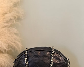 Authentic vintage Chanel quilted lambskin tassel shoulder bag