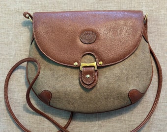 Authentic vintage Gucci canvas and leather handbag