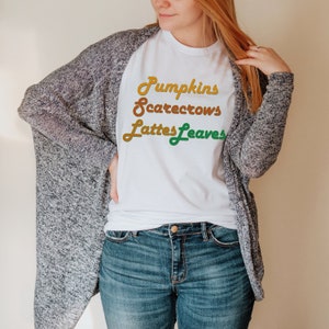 Pumpkins Scarecrows Lattes Leaves Fall Graphic Tee - Pumpkin TShirt, I Love Fall Gift for Her in Autumnal Colors
