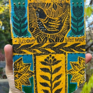 hand carved stamps on canvas prayer flags
