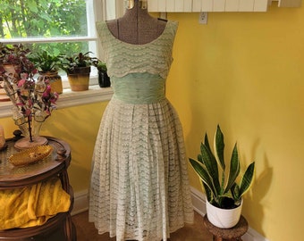 1950's A Melody Dress in light mint green with sheer lace overlay and sewn in crinoline