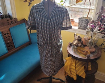 1960's Handmade day dress with chevron multicolour stripes and patch pockets. Bust 50" - Waist 43" - Hips 46". Size 16 US.