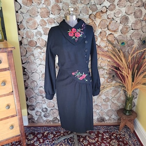 1960&#39;s Wool dress with asymmetrical collar and embroidered waist detail.