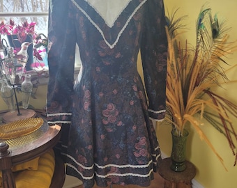 1980's Gunne Sax by Jessica McClintock in black with a dusty rose floral pattern.