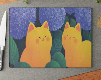 Glazen snijplank voor katten en hortensia's - grillig keukendecor