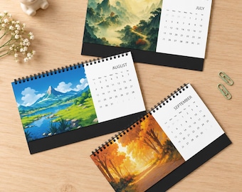May include: Three spiral-bound desk calendars featuring landscape illustrations for July, August, and September. The July page shows misty mountains, August depicts a blue lake and mountain, and September displays an autumn forest scene.