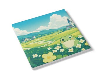 May include: Square ceramic coaster featuring a cartoon frog in a field of flowers. The background depicts a sunny landscape with rolling green hills, houses, and a church under a blue sky with fluffy white clouds. The coaster has a white border.