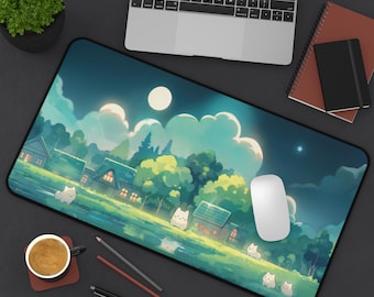 Puede incluir: Una alfombrilla de ratón azul y verde con una ilustración de dibujos animados de un cielo nocturno con luna llena, nubes y un pequeño pueblo. Hay gatos de dibujos animados blancos caminando por un sendero en primer plano.