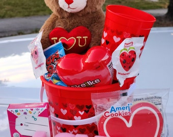 Valentine's Day Gift basket for any Age. Kids will love a Bucket of surprises