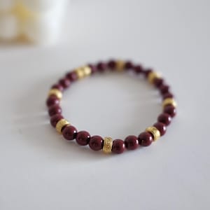 Burgundy Cinnabar Beaded Stretch Bracelet with Gold Accents – Handmade Jewelry for Everyday Elegance
